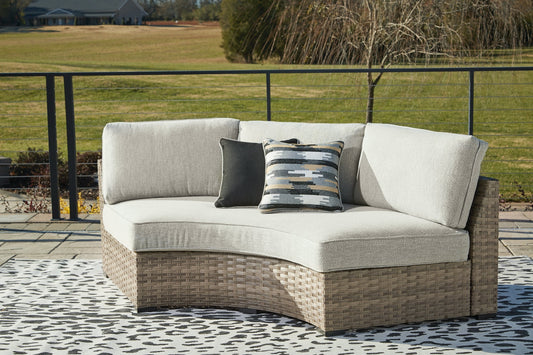Calworth Curved Loveseat with Cushion JR Furniture Store