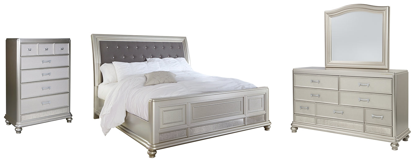 Coralayne California King Upholstered Sleigh Bed with Mirrored Dresser and Chest JR Furniture Store