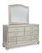 Coralayne King Upholstered Bed with Mirrored Dresser and Chest JR Furniture Store