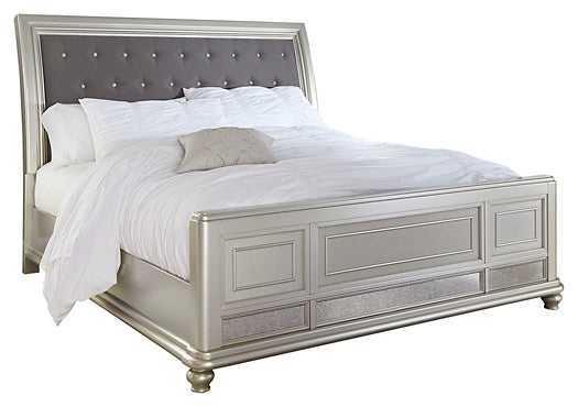 Coralayne King Upholstered Sleigh Bed with Mirrored Dresser, Chest and Nightstand JR Furniture Store