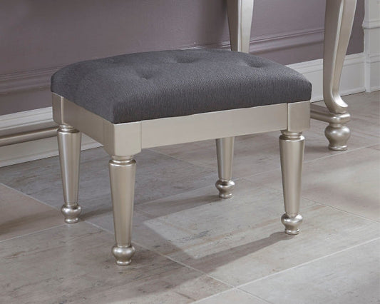 Coralayne Upholstered Stool (1/CN) JR Furniture Store