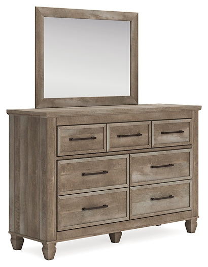 Yarbeck Queen Panel Bed with Storage with Mirrored Dresser
